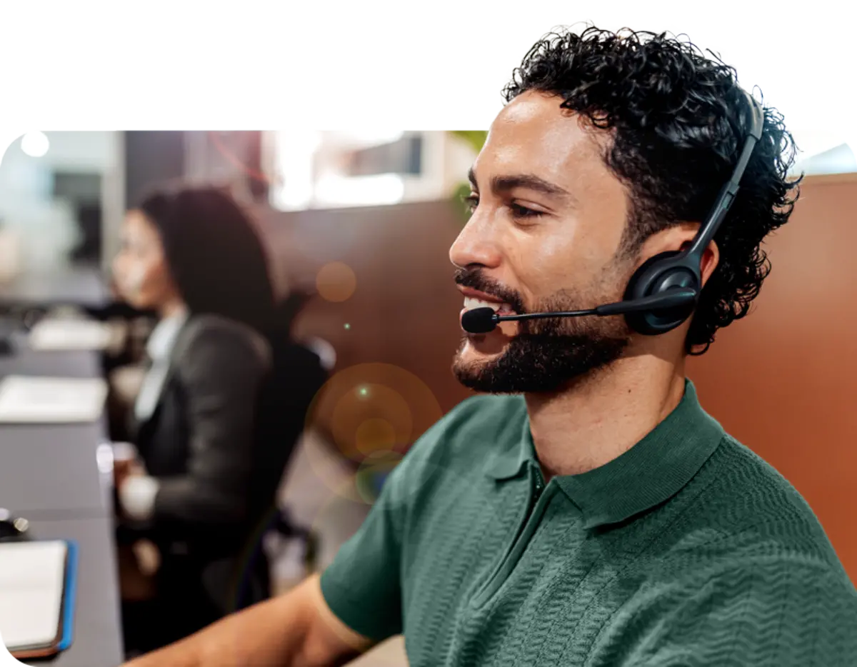 Man wearing headset delivering care coordination